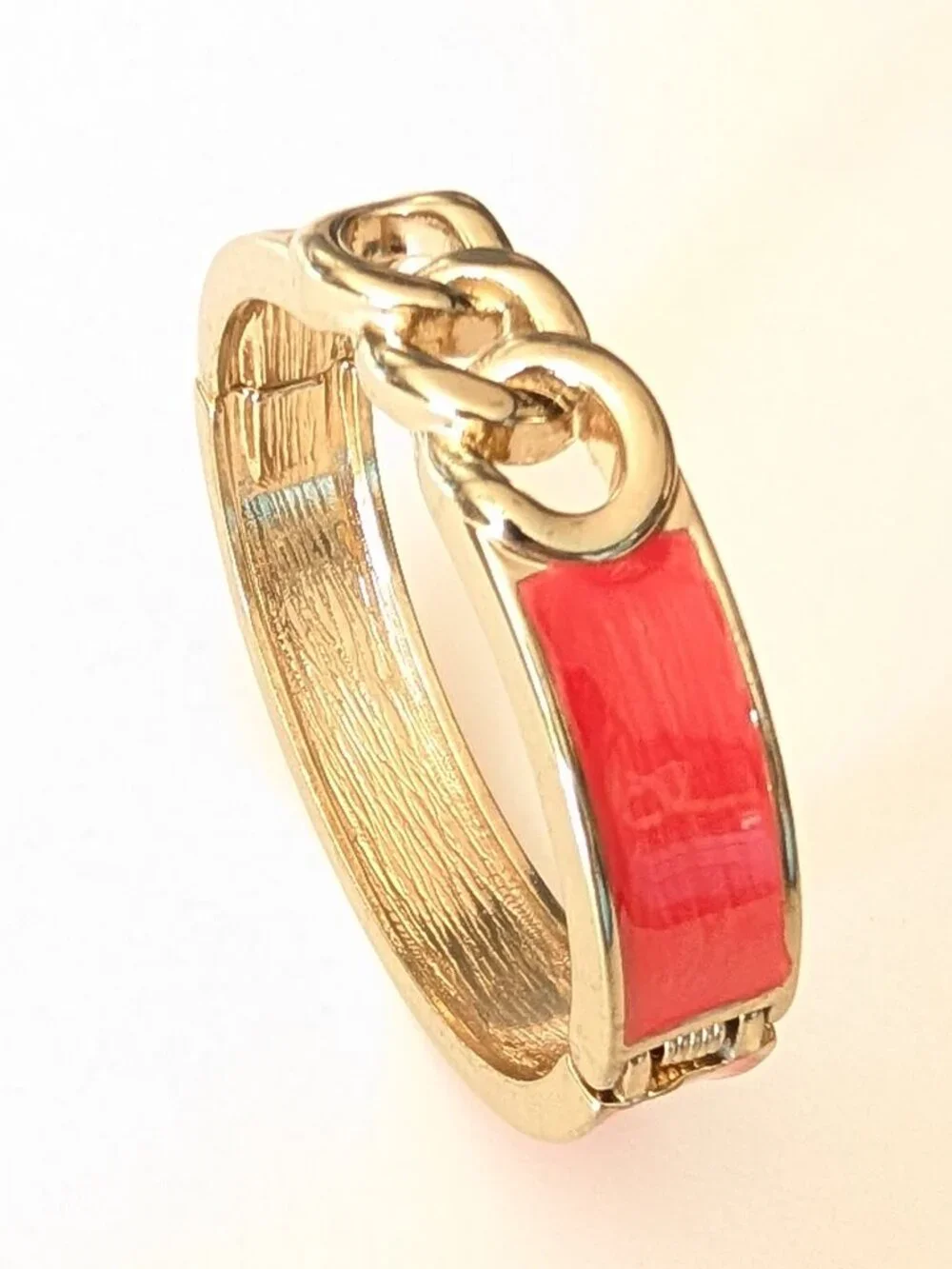 Gold and orange enamel bangle